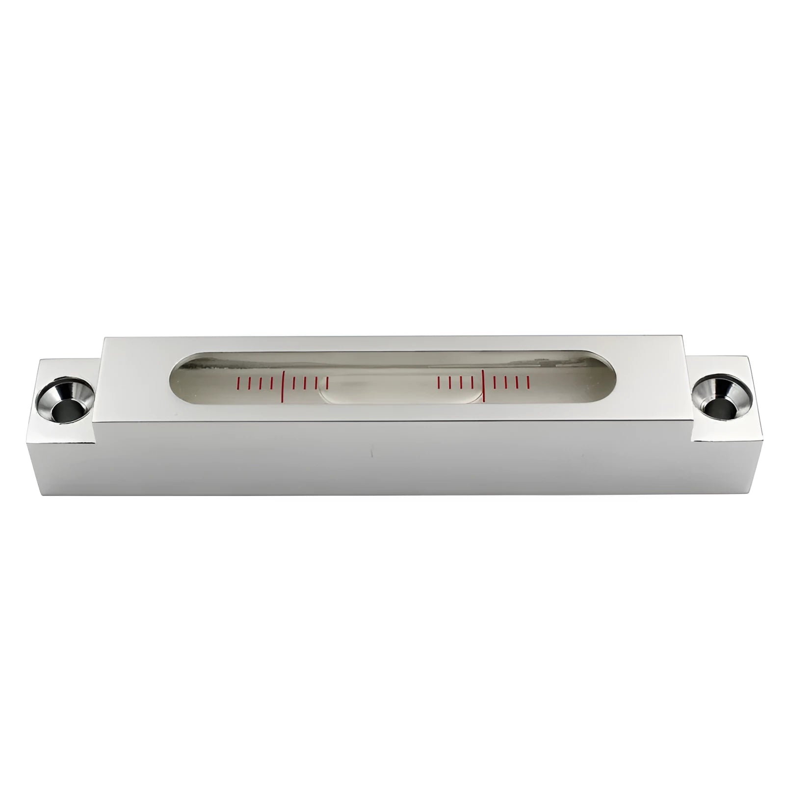 Small silver metal spirit level with glass vials on a workshop bench