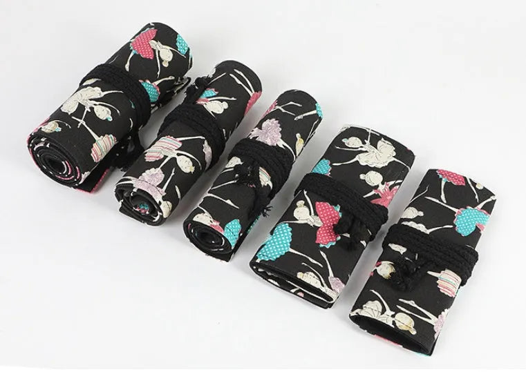 Ballet girl printed canvas roll-up pencil case unrolled to show multiple coloured pencils in slots