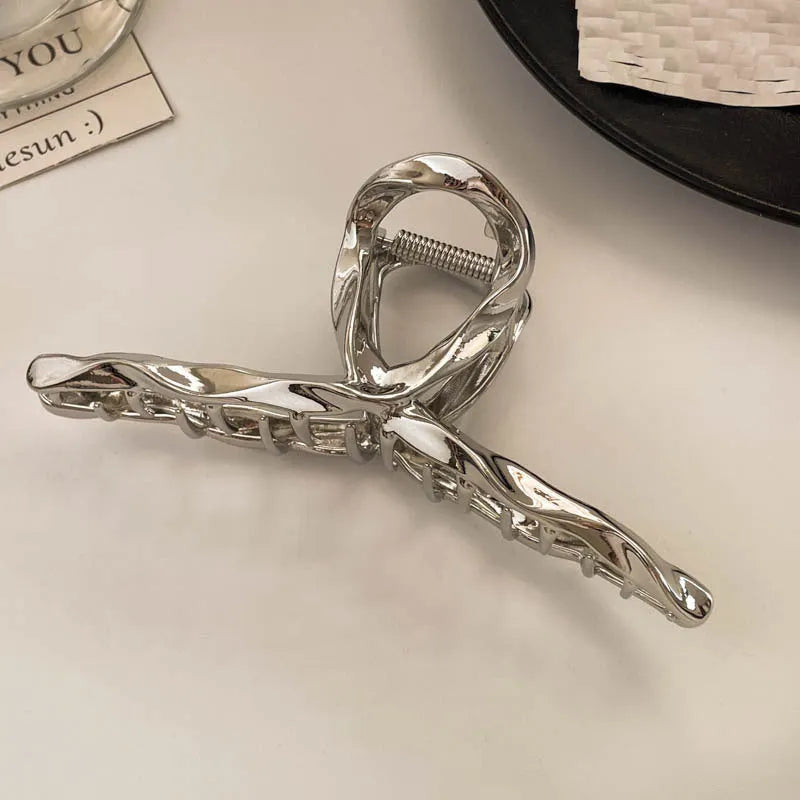 Silver metal hair barrette claw clip with electroplated finish and decorative design