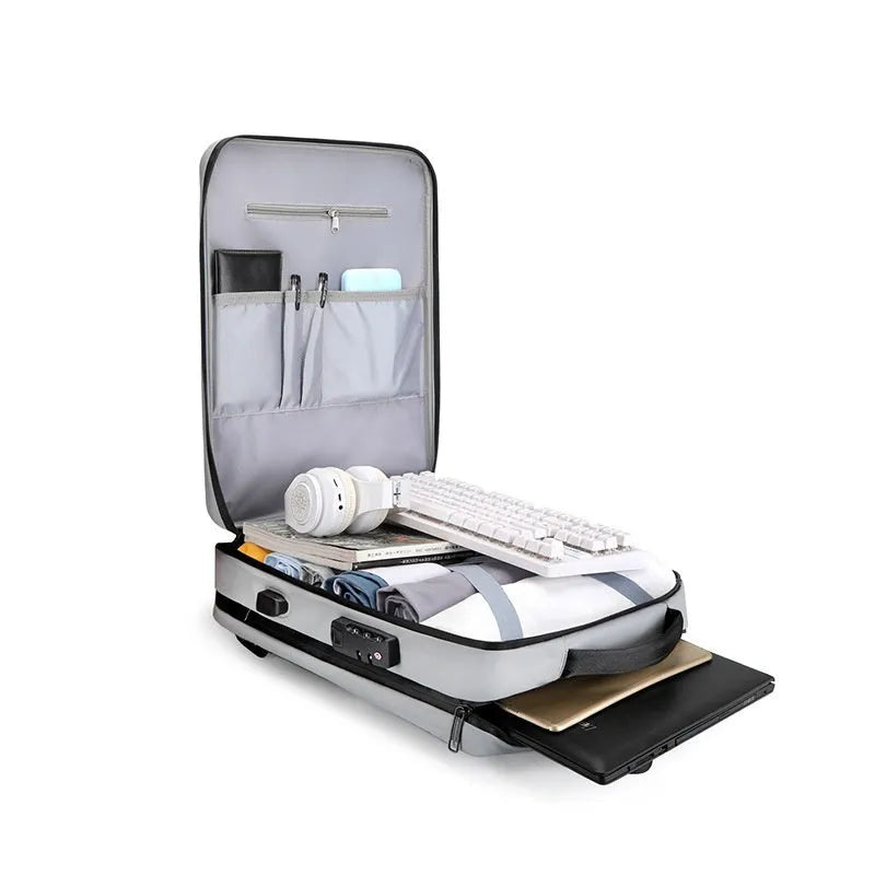 Black and silver white waterproof ABS PC business backpack with curved straps, shown with a laptop.