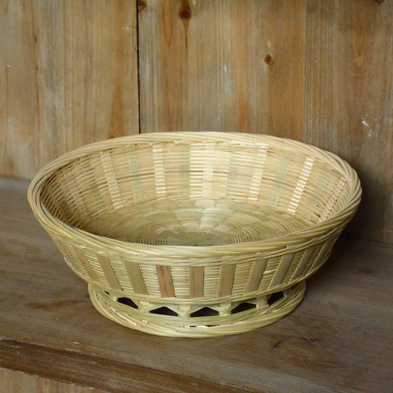 Handmade natural bamboo storage basket in a rectangular woven shape.