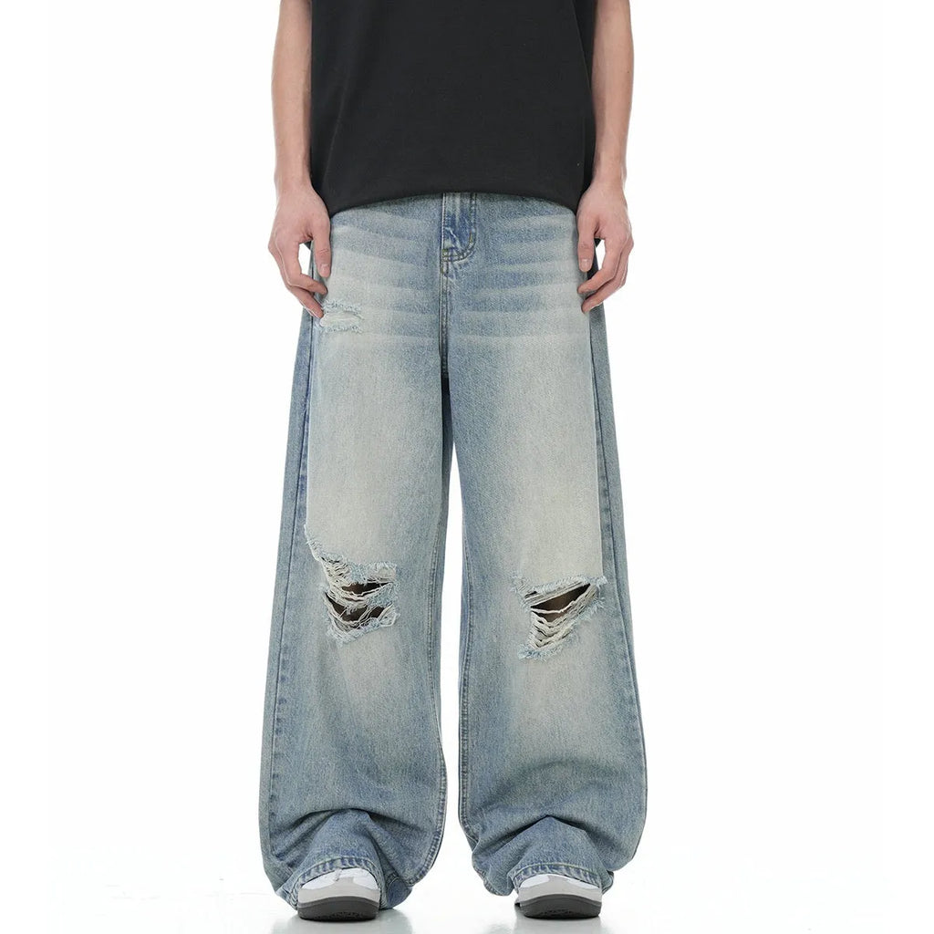 Blue men's ripped jeans with straight-leg cut and zipper fly