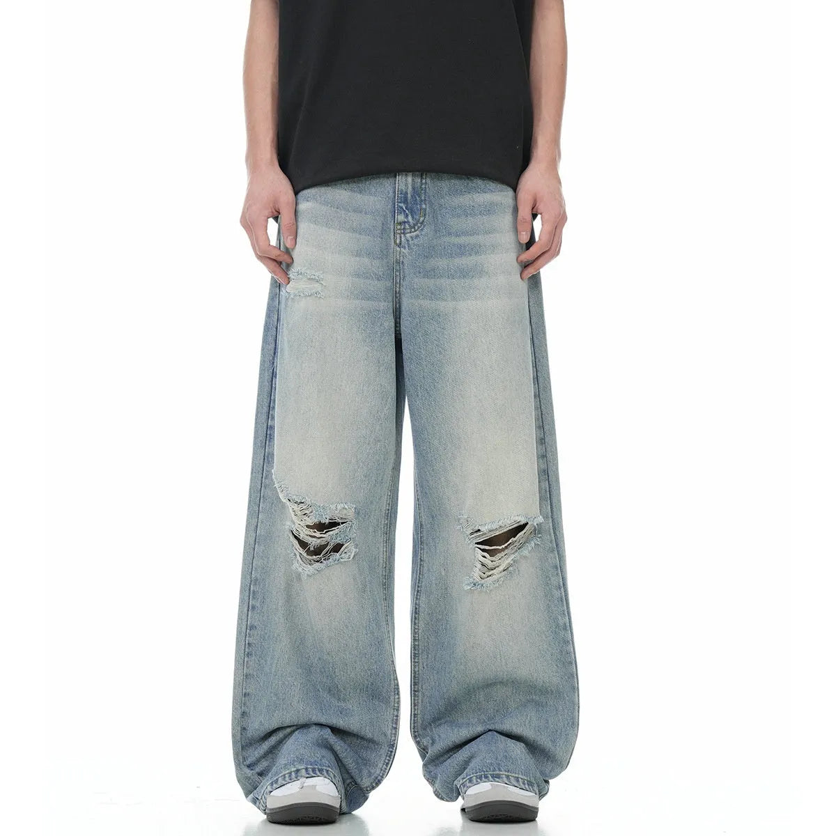 Blue men's ripped jeans with straight-leg cut and zipper fly