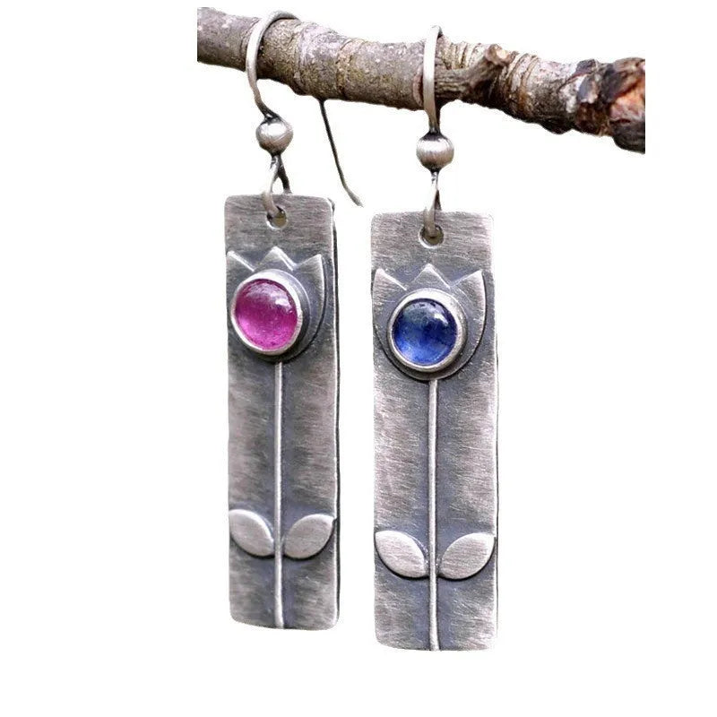 Antique finish red sapphire earrings with geometric ellipse shape in retro style