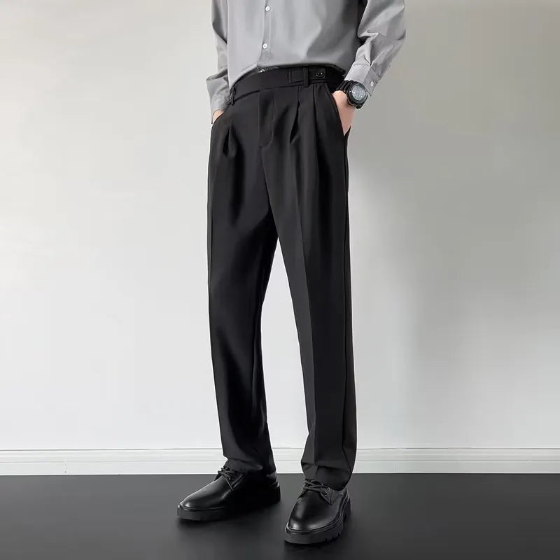 Men's straight-leg loose fit suit trousers in apricot colour on a hanger.