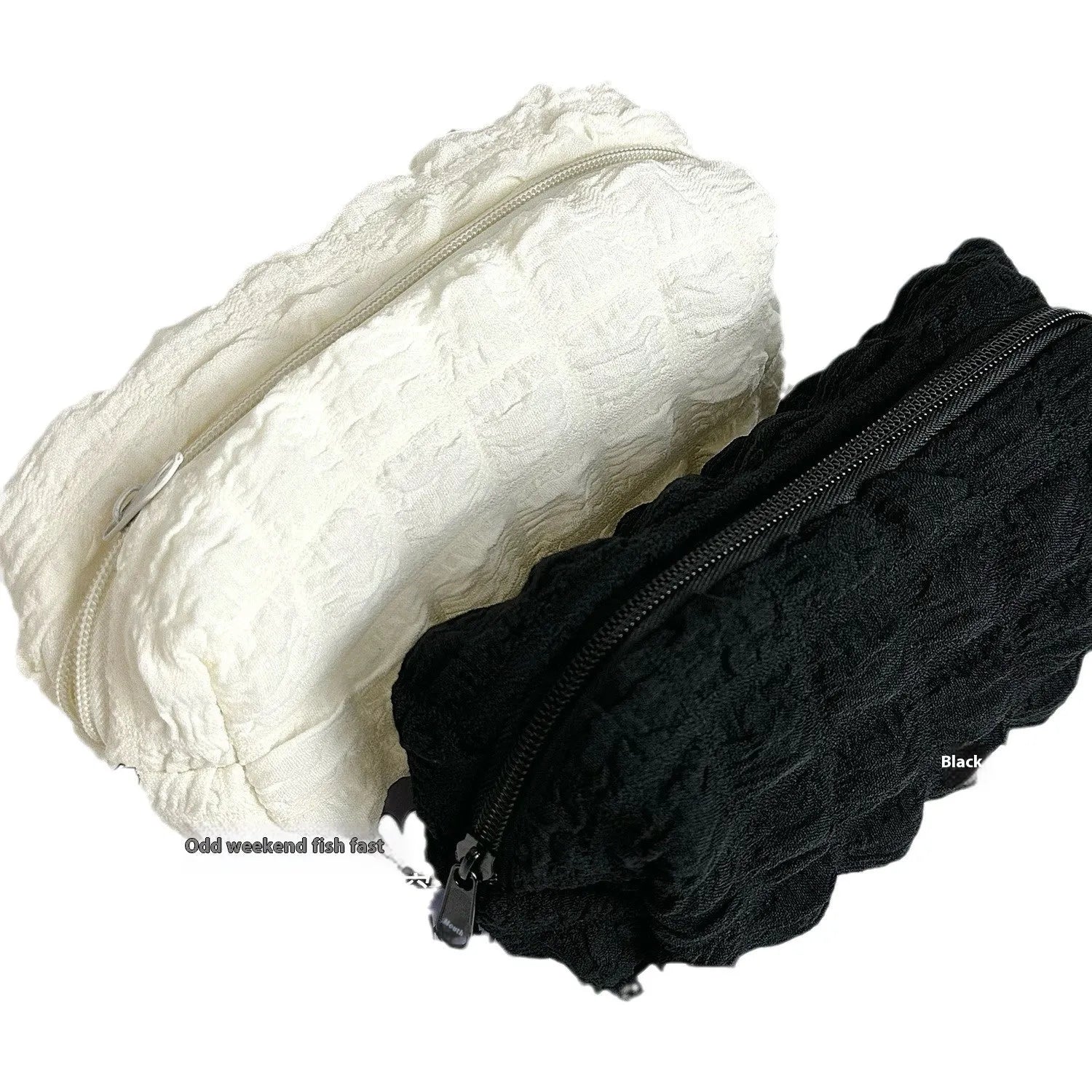 Cream puff fabric pencil case in beige or black colour with zippered closure