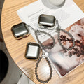 Matte plating TPU protective case for Apple AirPods shown on a table.