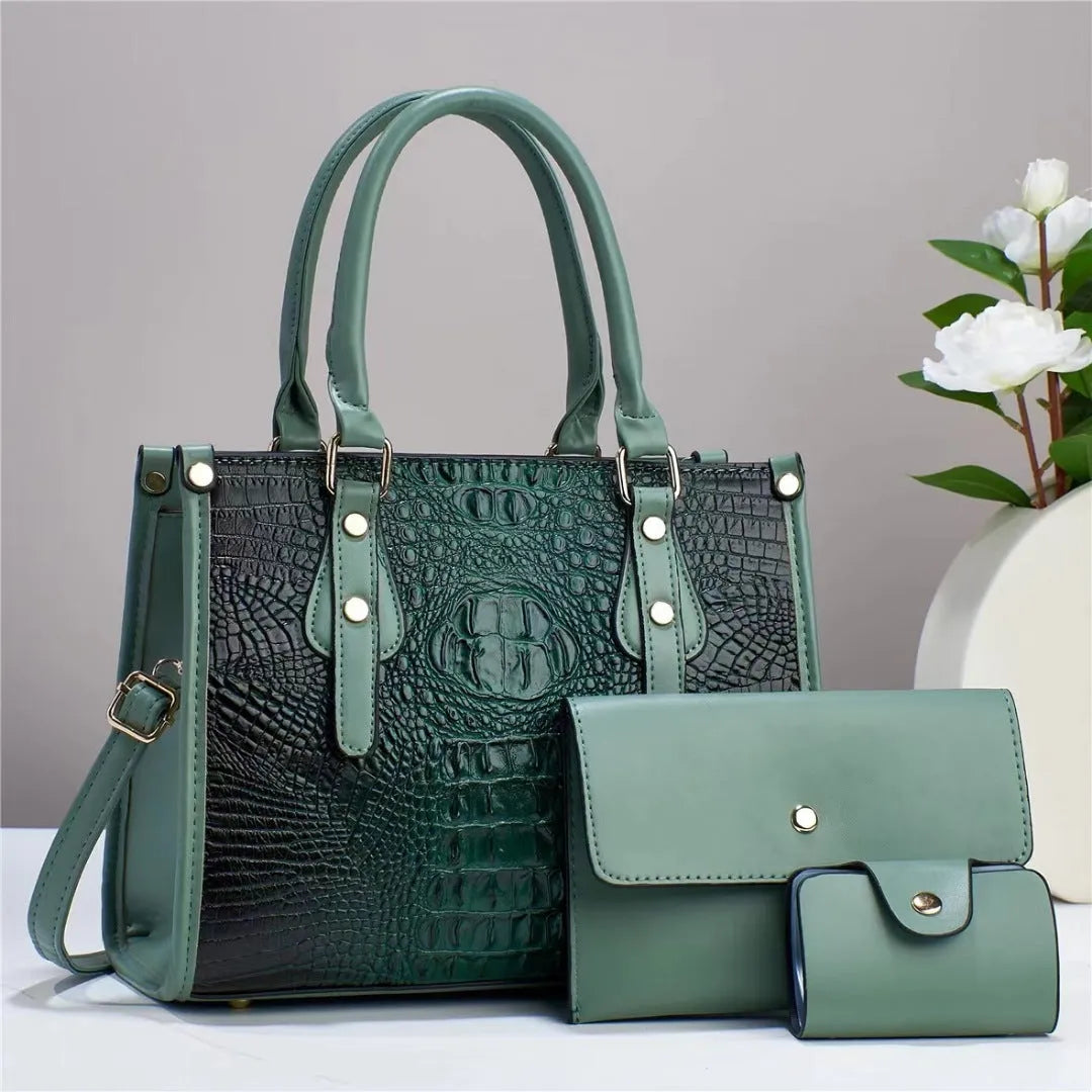 Minimalist textured PU three-piece bag set showing crossbody bag, wallet, and card holder in a contrast colour.