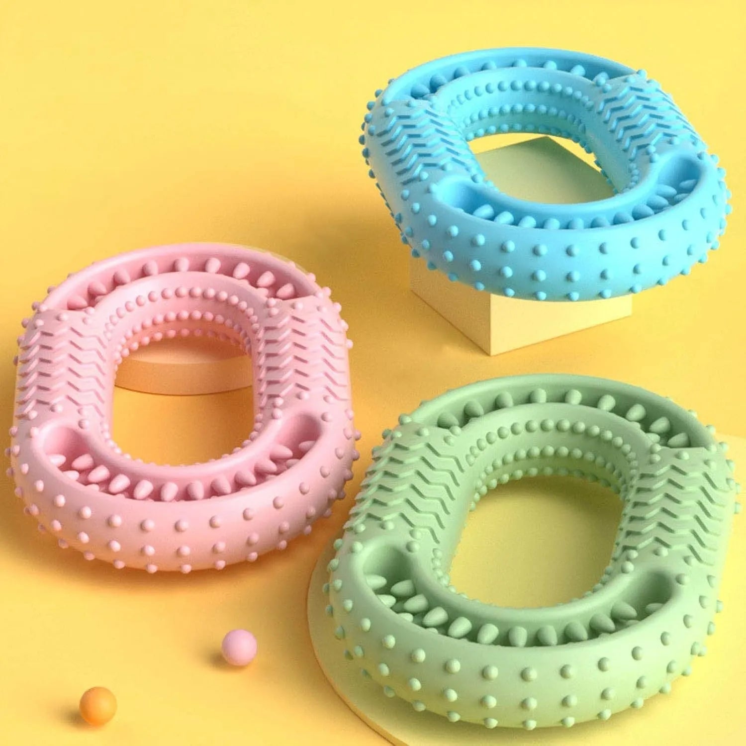 Blue green pink resistant O-ring dog chewing toy for aggressive chewers measuring 12.5cm