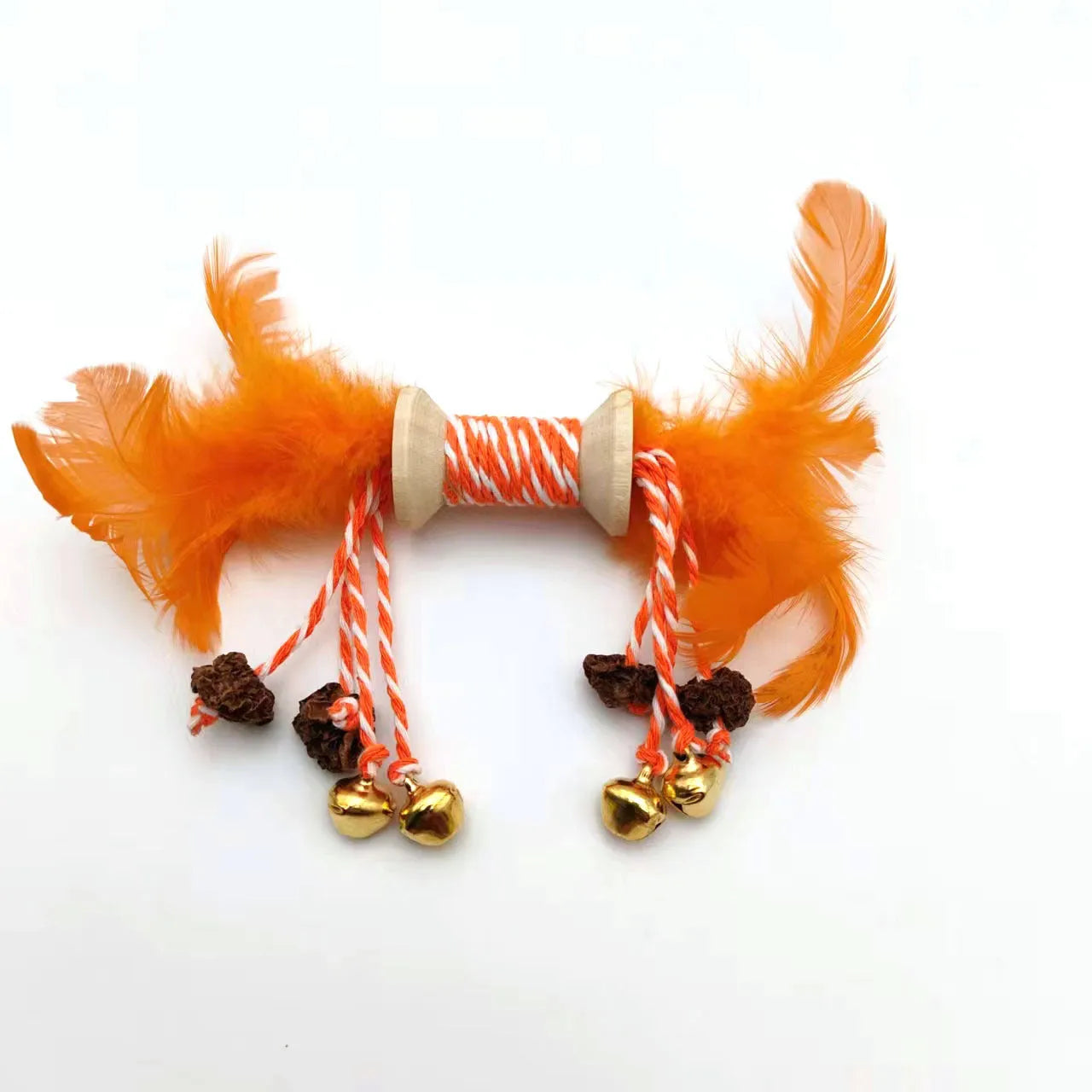 Feather bell gall fruit cat toy in ginger colour with bells and feathers on green background