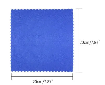 Car iron powder rust remover spray bottle with blue sponge and towel on a car surface.