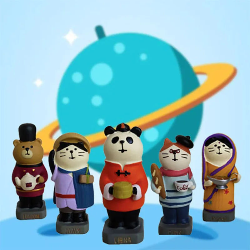 Cartoon cat resin figurine with Statue of Liberty and globe travel theme.