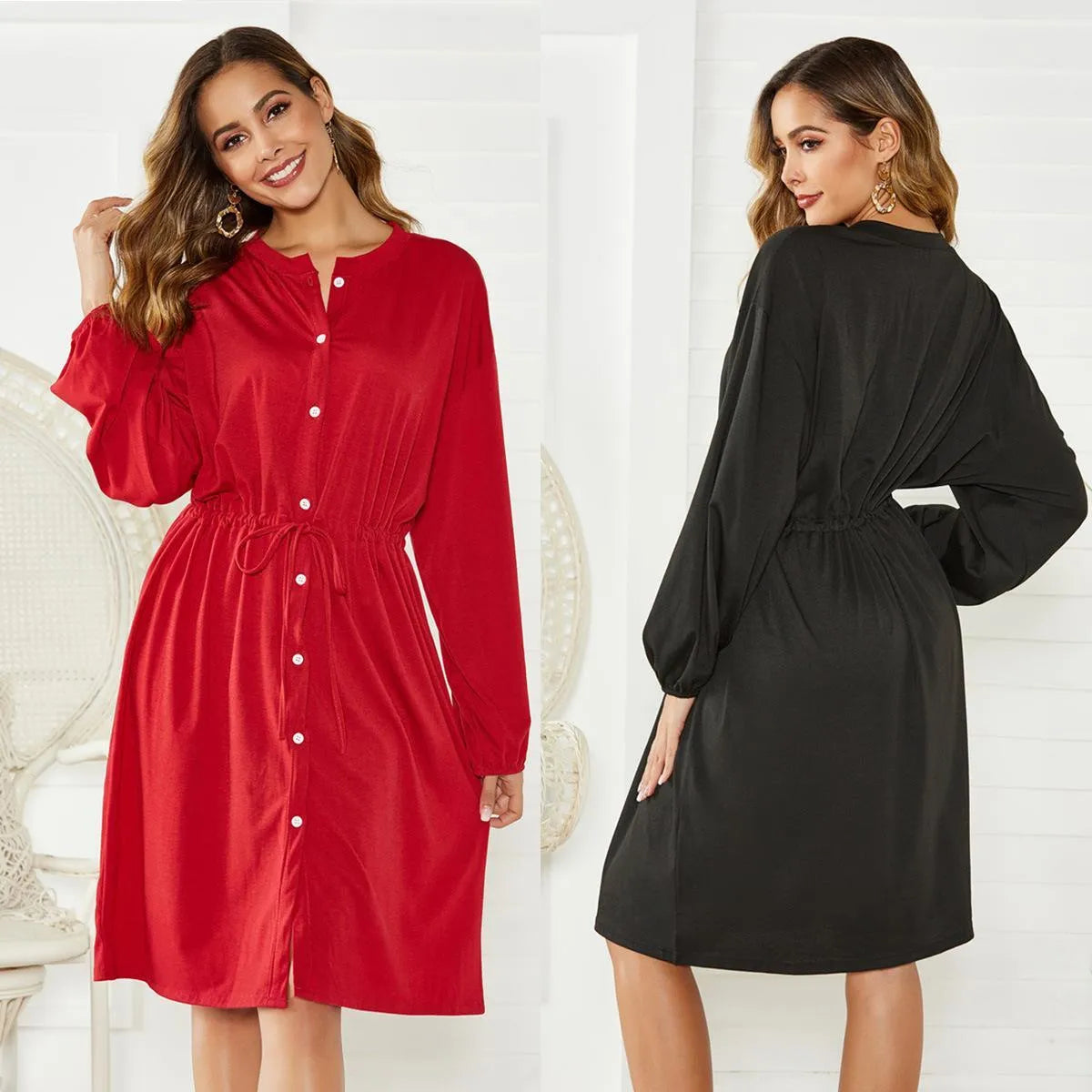 Black loose A-line midi dress with long sleeves, elastic cuffs, and an elasticated waist with a belt.