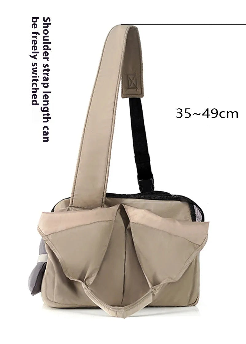Apricot coloured cloth pet carrier handbag for small dogs or cats, showing carrying handles.
