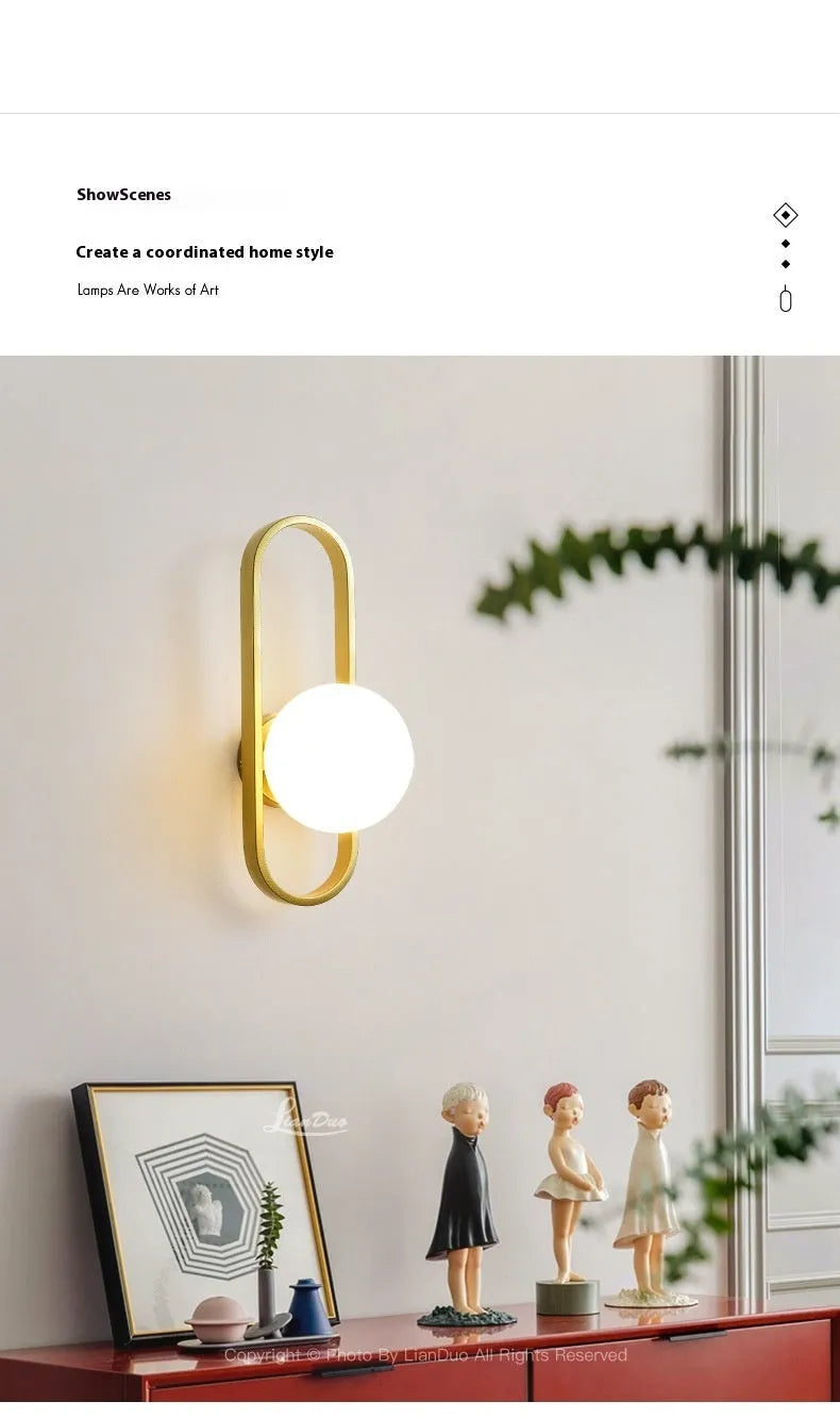 Minimalist wall lamp with glass shade and iron body in black or gold finish