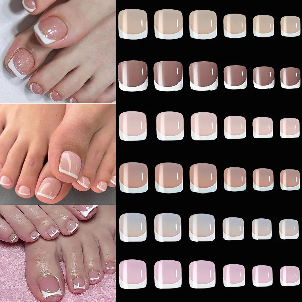Box of 120 French white edge nude false toe nail pieces in assorted shades on a table
