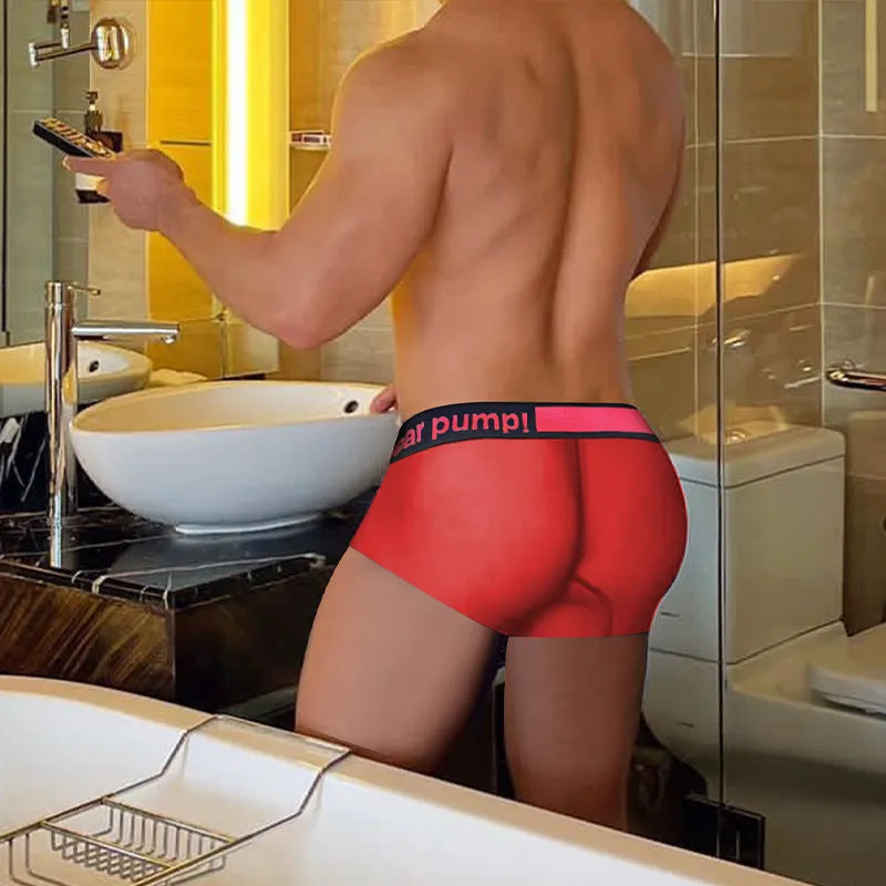 Men's black low waist seamless underwear with a red gradient laser print design on the front