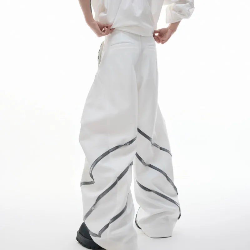 Men's black and white polyester trousers with three-dimensional cut and metal striped rivet pleats
