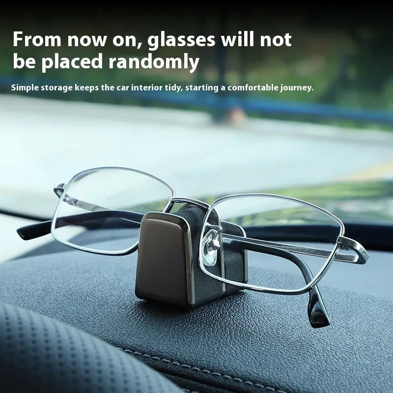 Zinc alloy car glasses clip with leather pad in choice of colours for dashboard or visor.