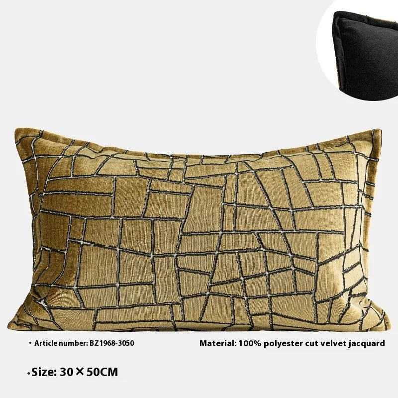 Tuhao gold geometric abstract pattern on a square decorative cushion with tassel detail.