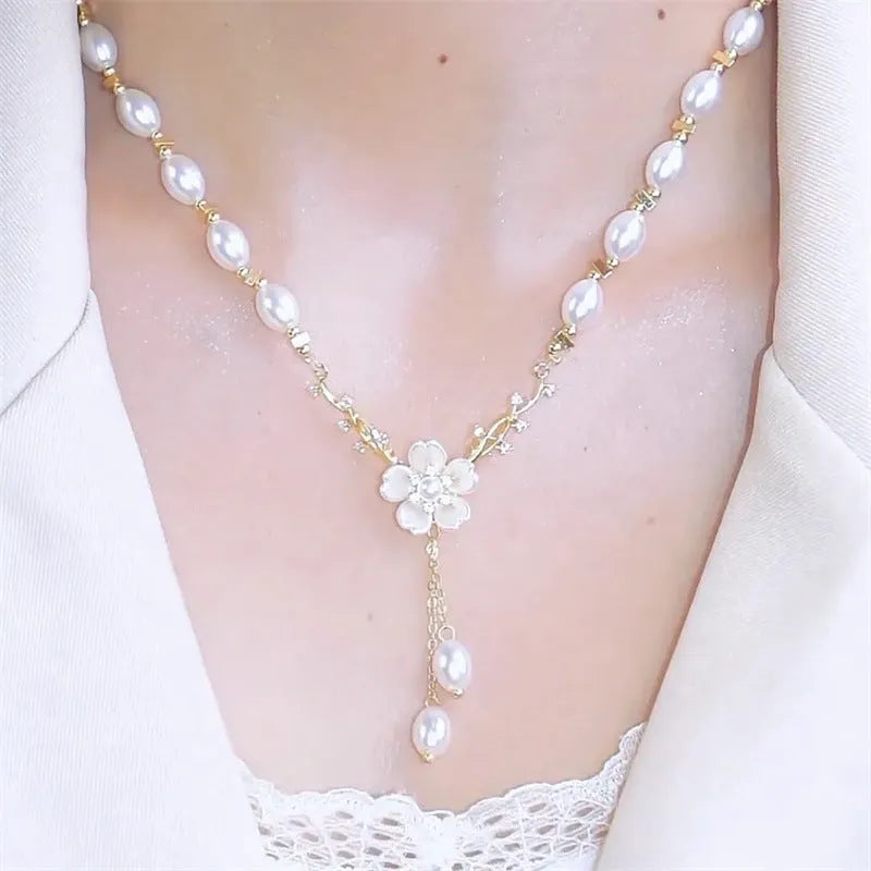 Alloy necklace with pearl flower pendant and floral design on pearl chain
