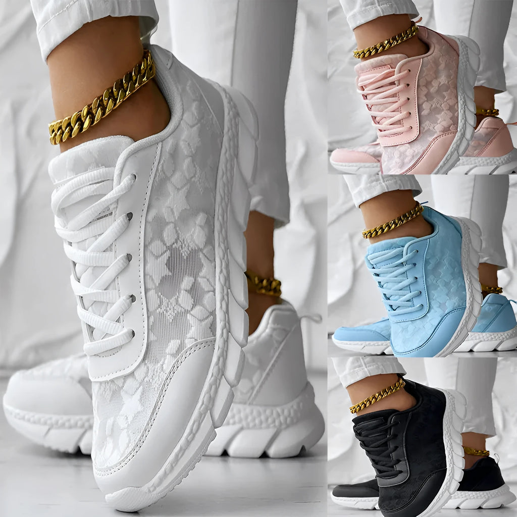 Women's casual canvas running shoes in white, black, blue or pink with flat heel and round toe design