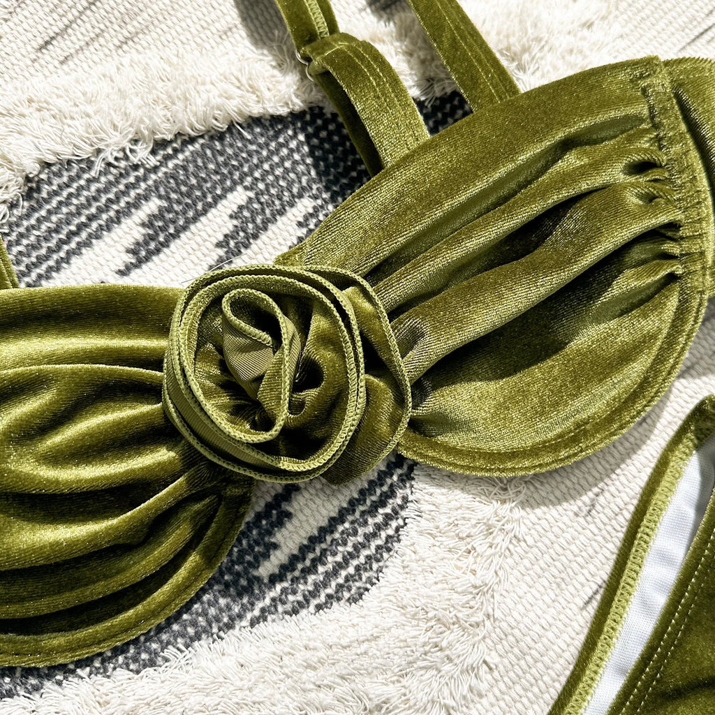 Women's green swimsuit with 3D floral pattern, brief style, for fitness and swimming.