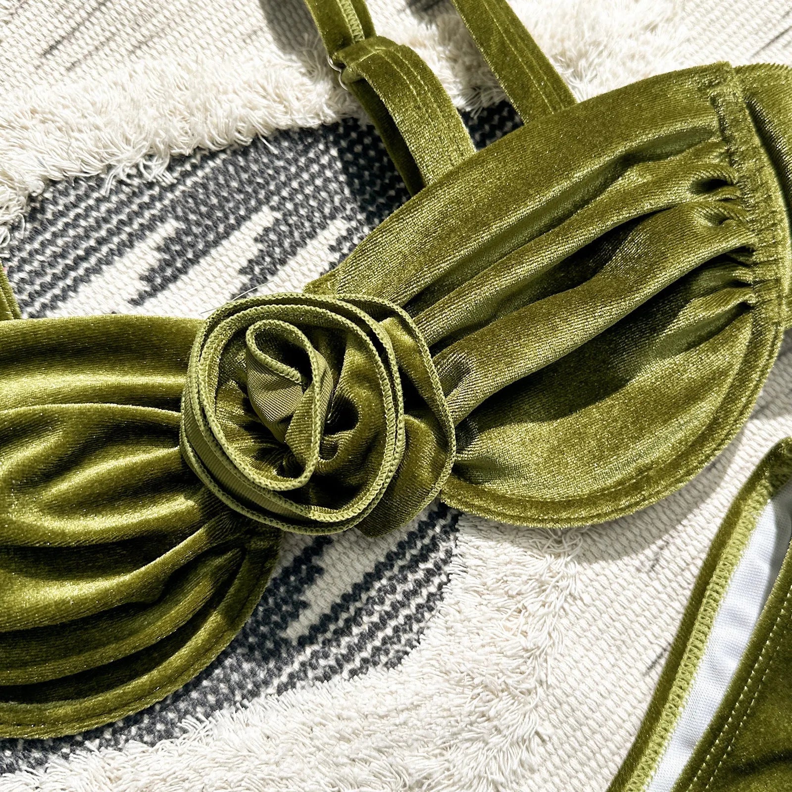 Women's green swimsuit with 3D floral pattern, brief style, for fitness and swimming.