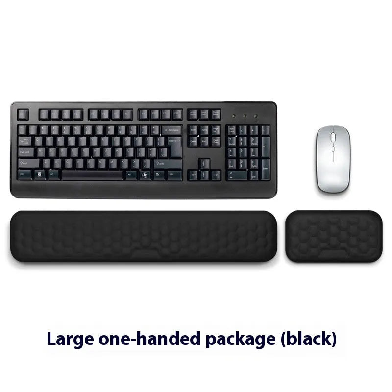 Memory foam mouse wrist rest pad with silicone base in black cloth cover option on desk