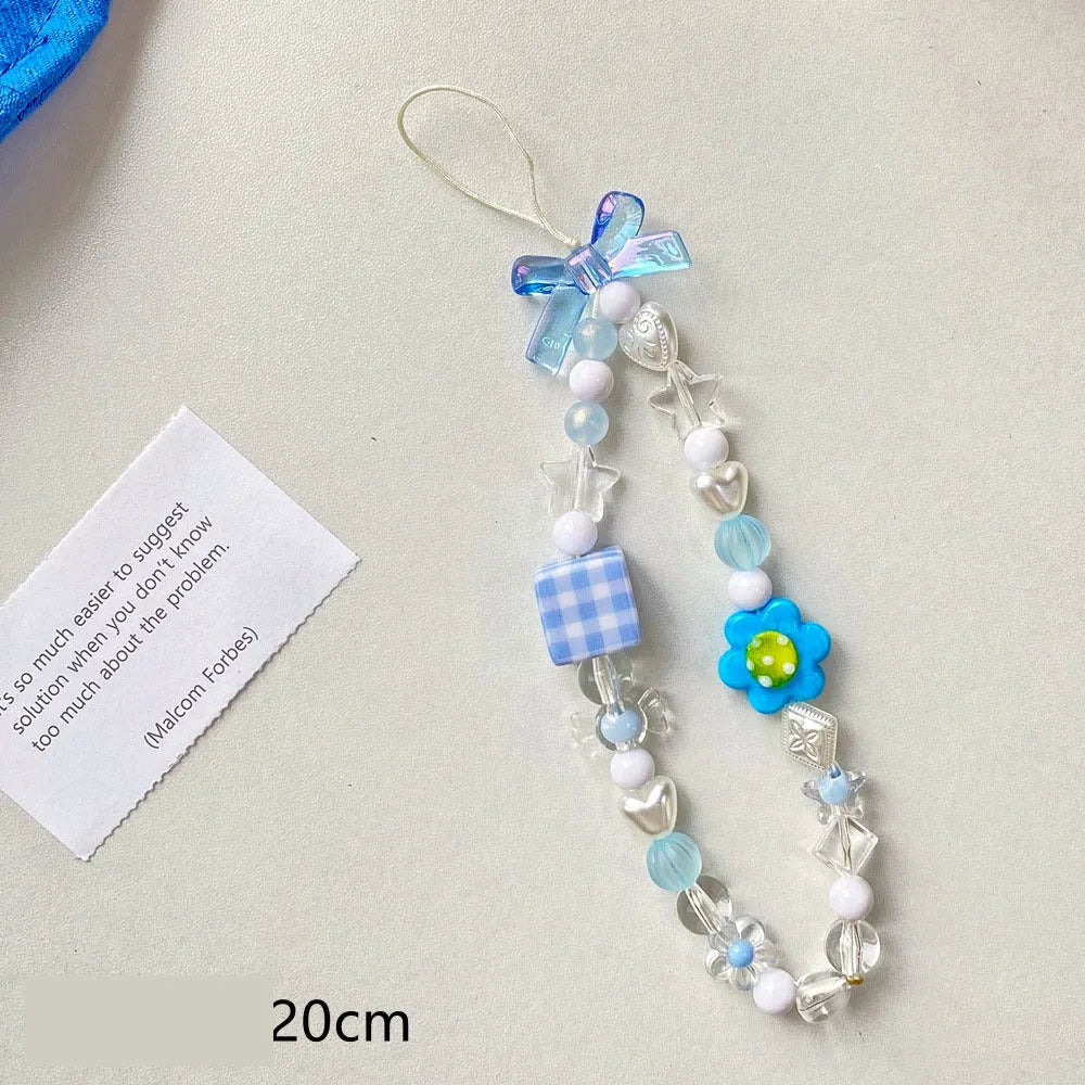 Colourful beaded flower mobile phone lanyard with plastic and resin construction