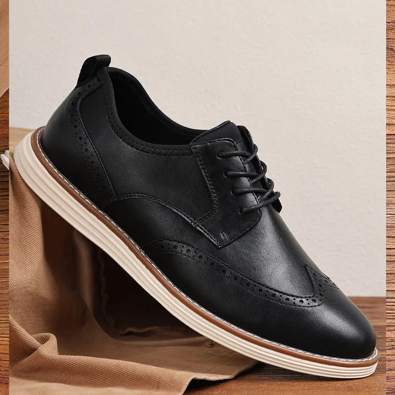 Men's black slip-on casual shoe with round toe and carved TPR sole for business wear.