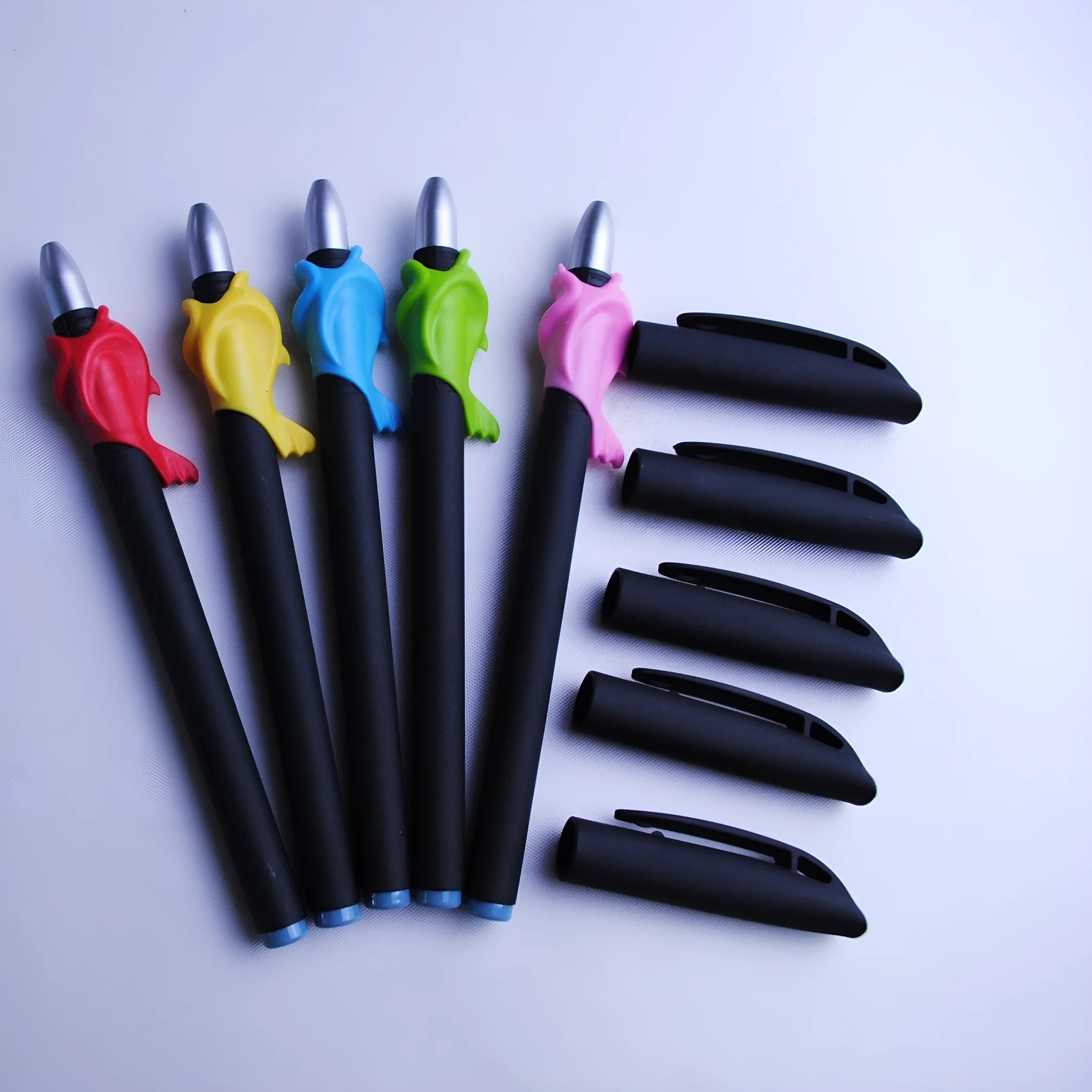 Blue automatic fading pen set with eight refills and pen holder showing 0.5mm tip