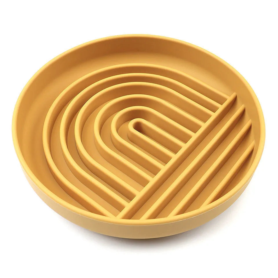 Silicone slow feeder dog bowl with ridges, shown in mustard green colour