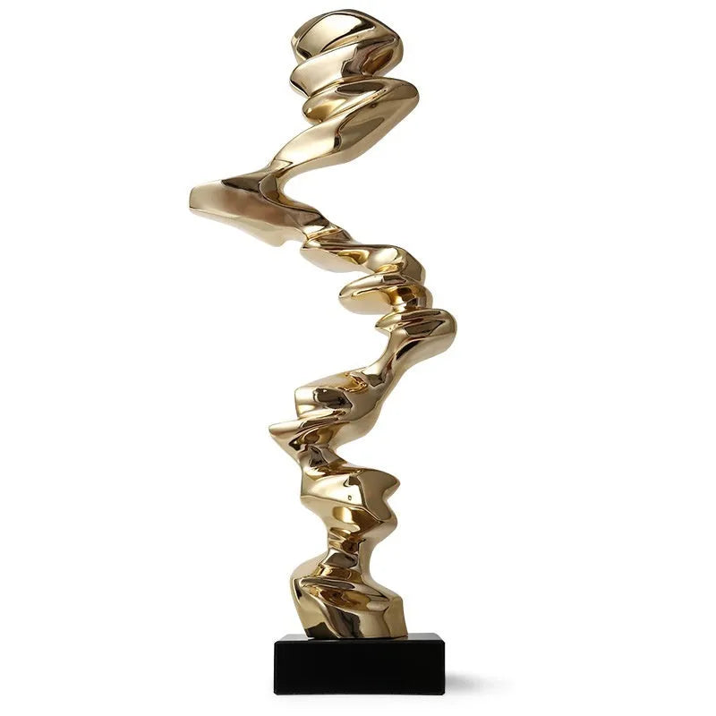 Modern abstract decorative ornament made from natural resin in a choice of gold, silver, or blue.