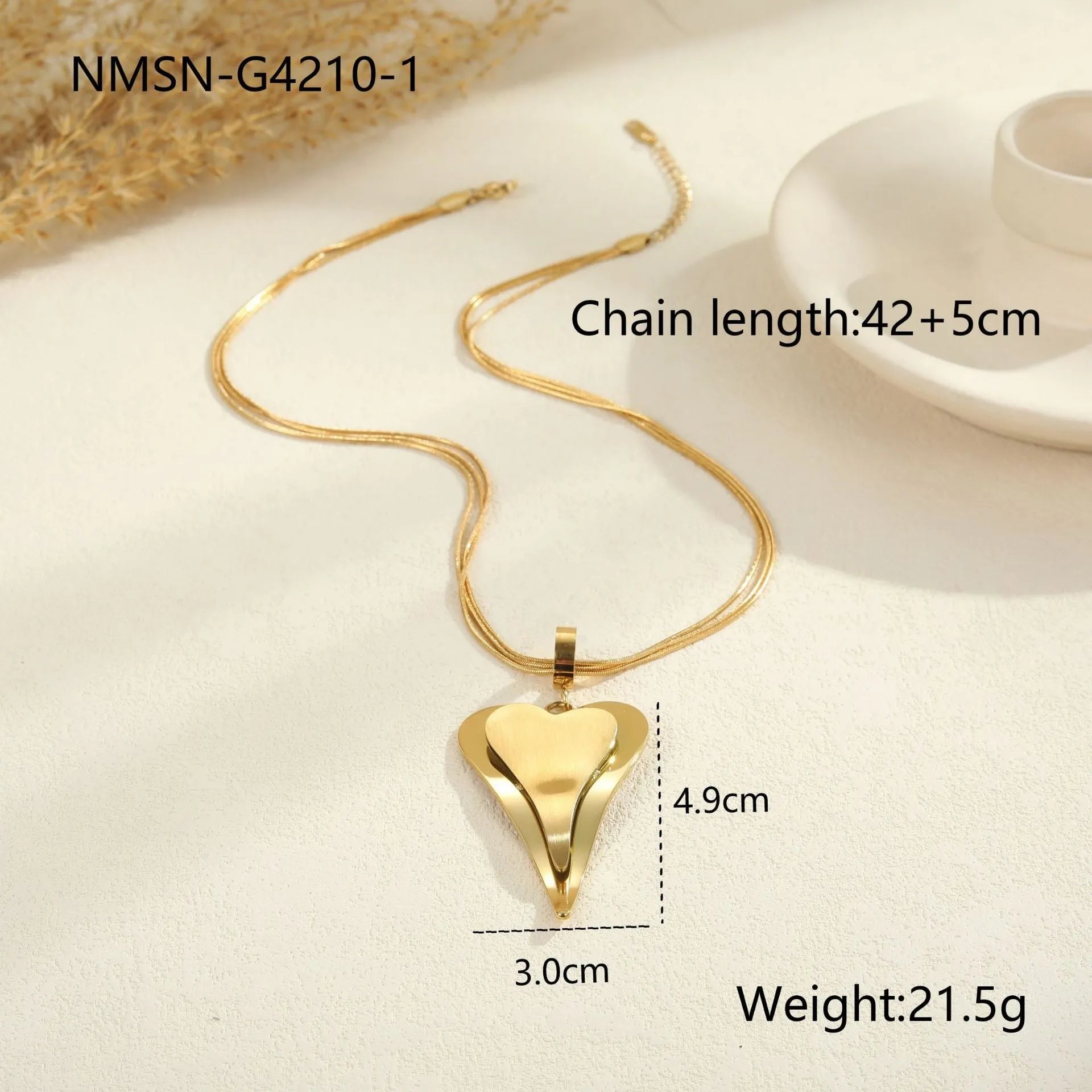 Stainless steel necklace with geometric double heart design formed from snake bones chain elements