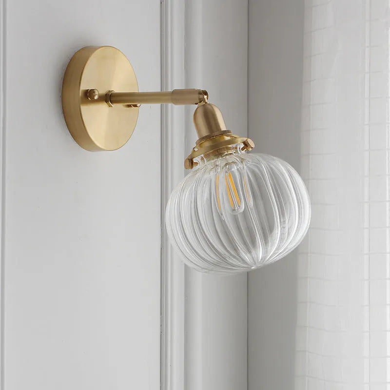 Pumpkin-shaped glass wall lamp for living room or bedroom accent lighting
