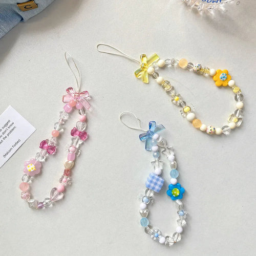 Colourful beaded flower mobile phone lanyard with plastic and resin construction