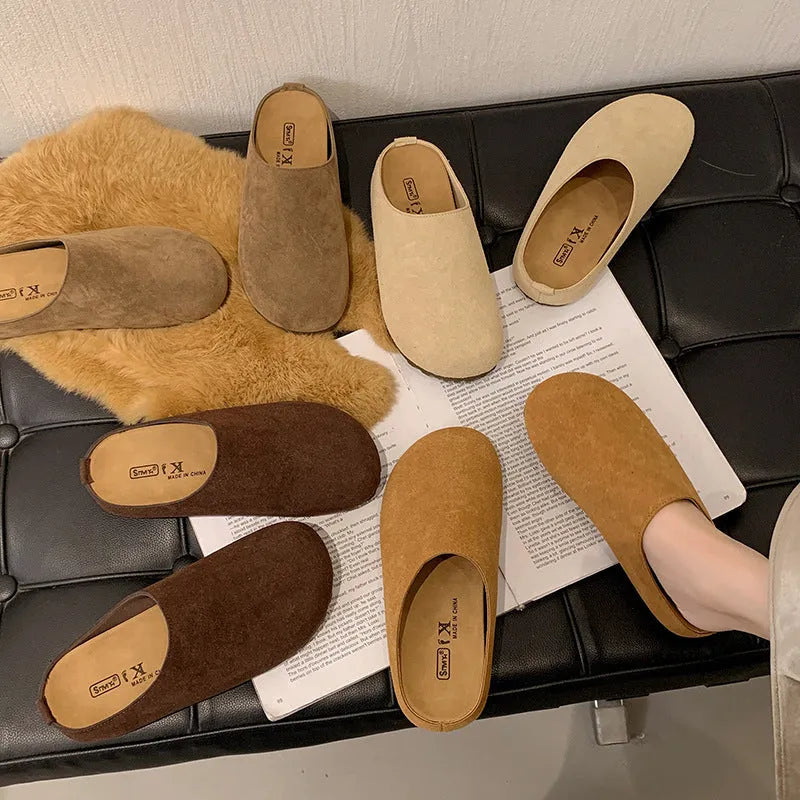 Soft flat slip-on slippers in apricot colour with square toe and microfibre upper.