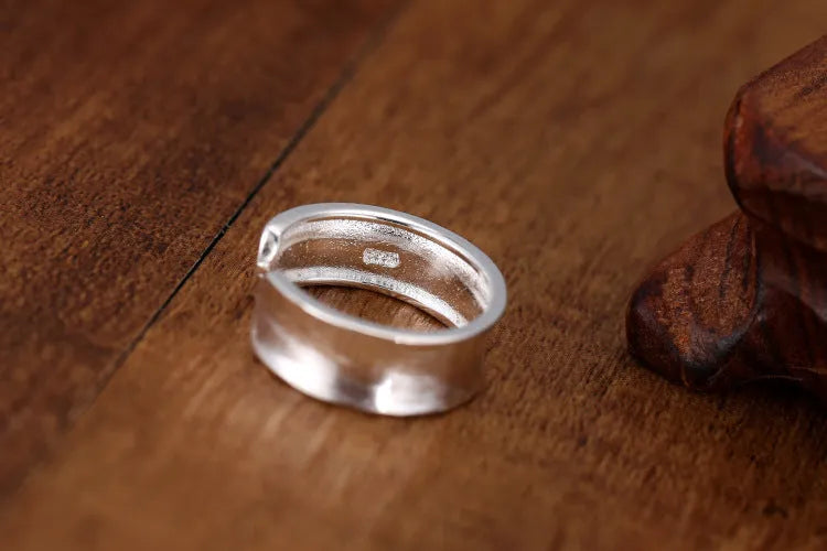 Geometric open sterling silver ring with frosted finish and adjustable opening