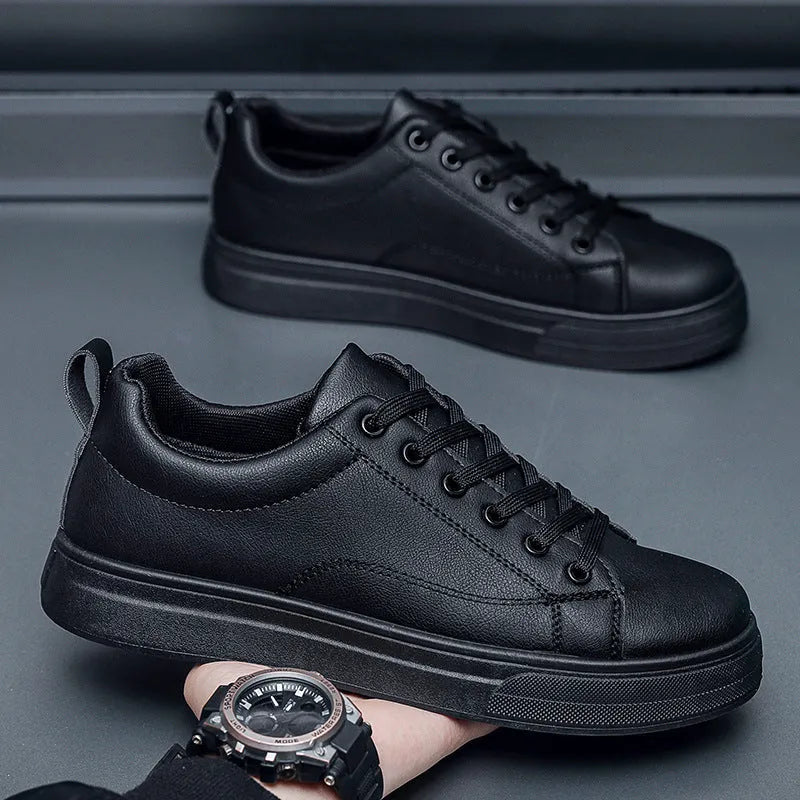 Men's Korean-style low-top sneakers in white, black, or two-tone colour with flat rubber sole