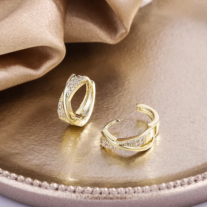 Geometric copper hoop earrings with zircon detailing in 14K yellow colour
