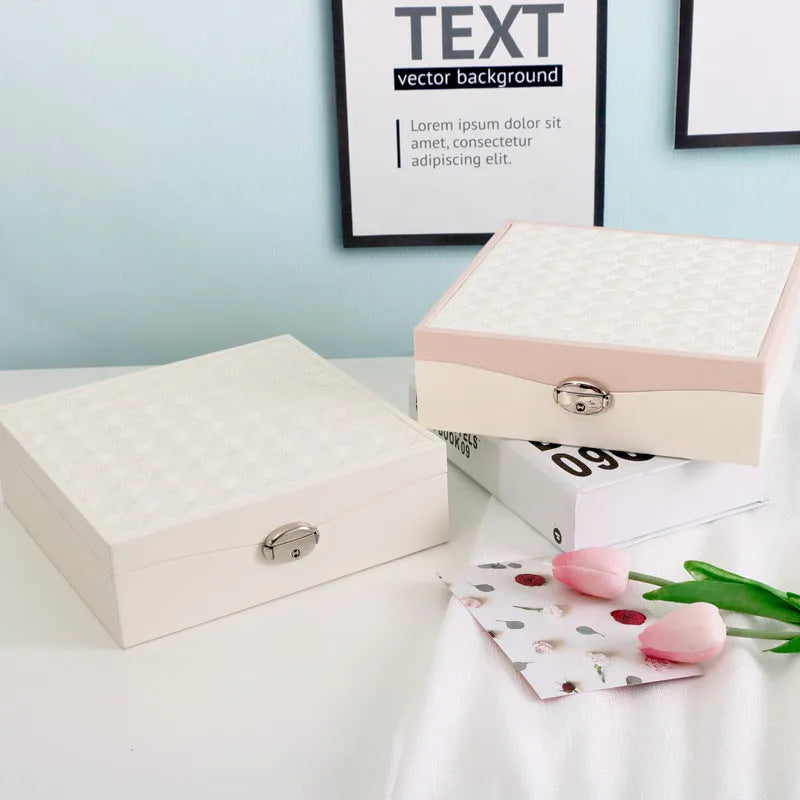 Red or white PU leather jewellery storage box with compartments for necklaces and rings