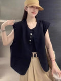 Women's loose fit polyester vest with pocket in milky white or black, 40cm short length
