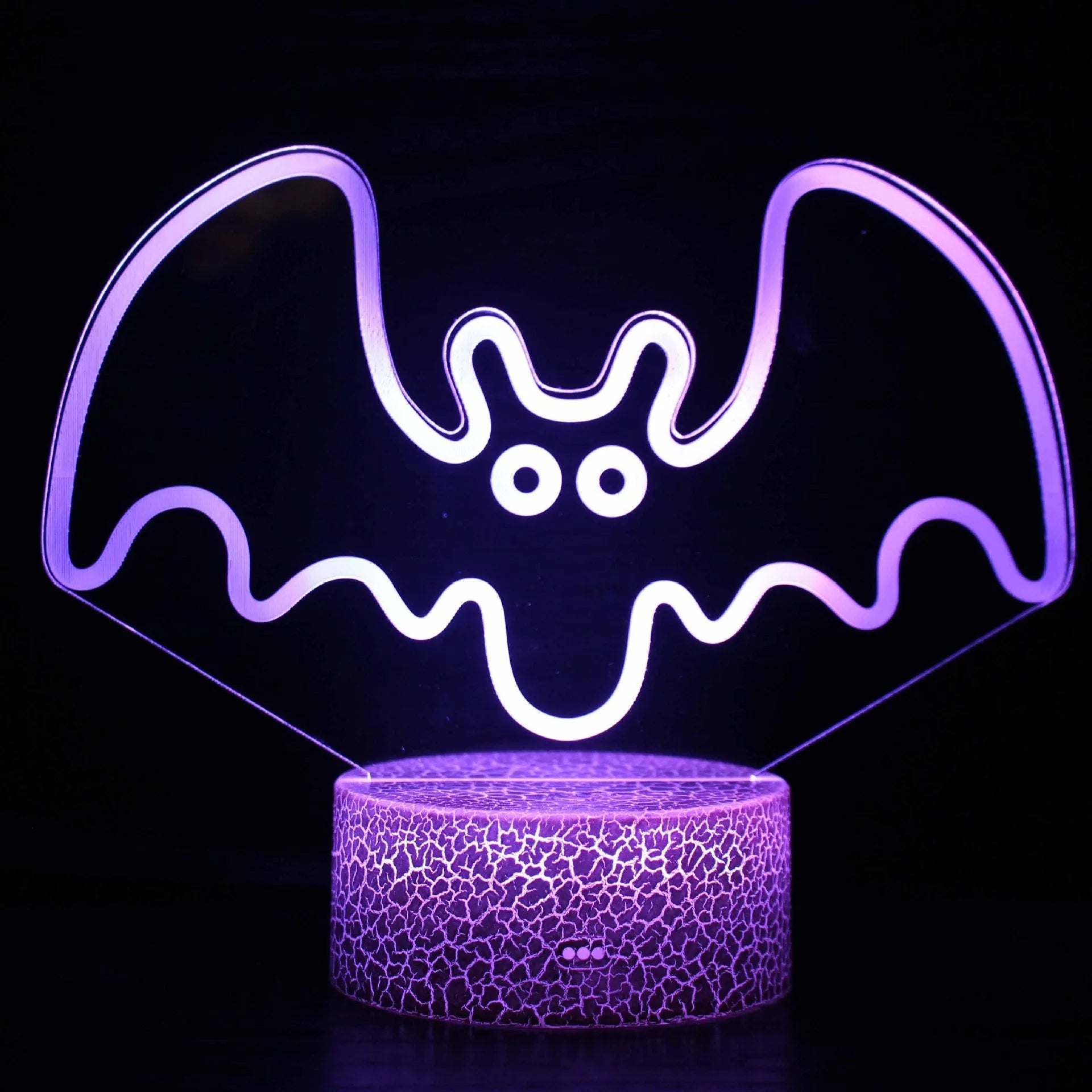 Colourful acrylic 3D touch USB table lamp with ABS base on a desk