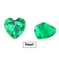 Cultivated emerald gemstone in Columbian green colour showing various polished cuts on a white background.