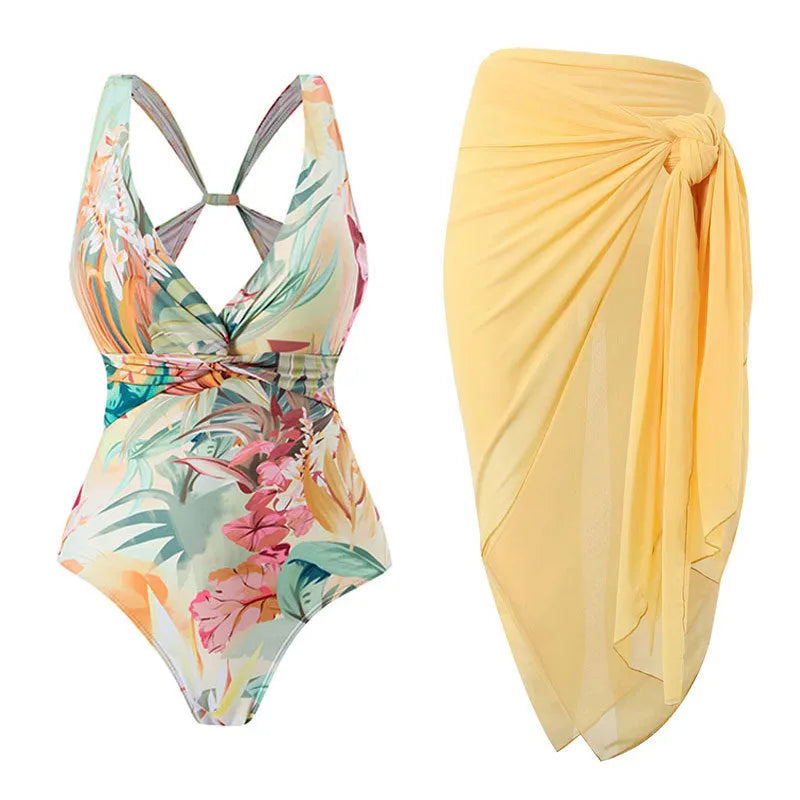 Women's conservative one-piece swimsuit with short sleeves in a vintage yellow floral print pattern.