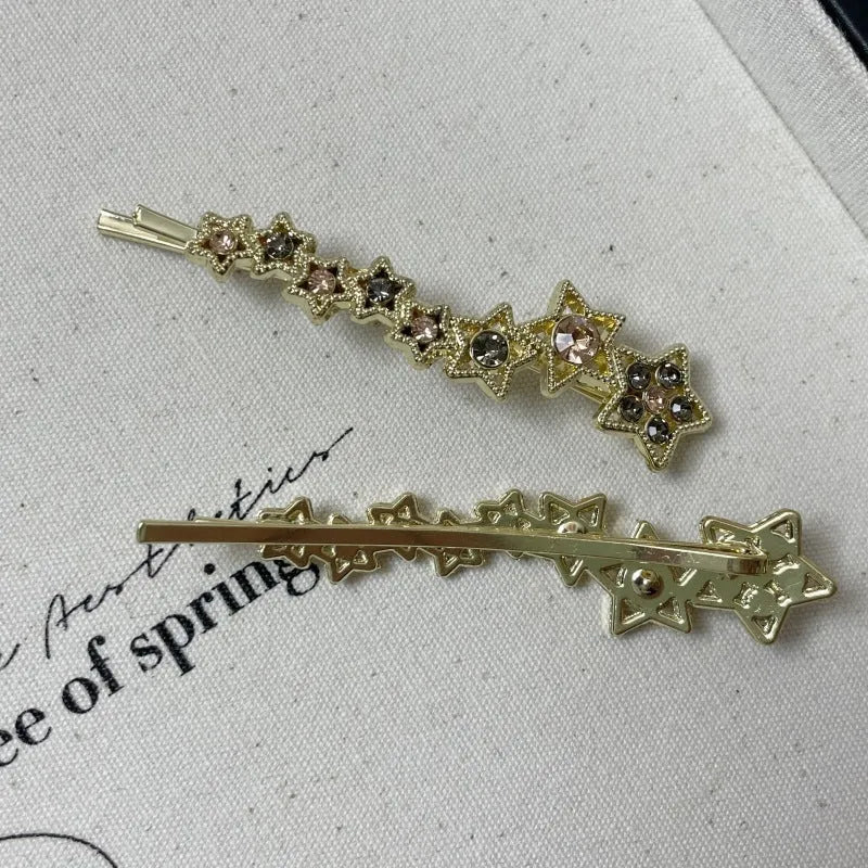 Gold-coloured Korean style hair clip barrette with side clip design and five-pointed star decoration