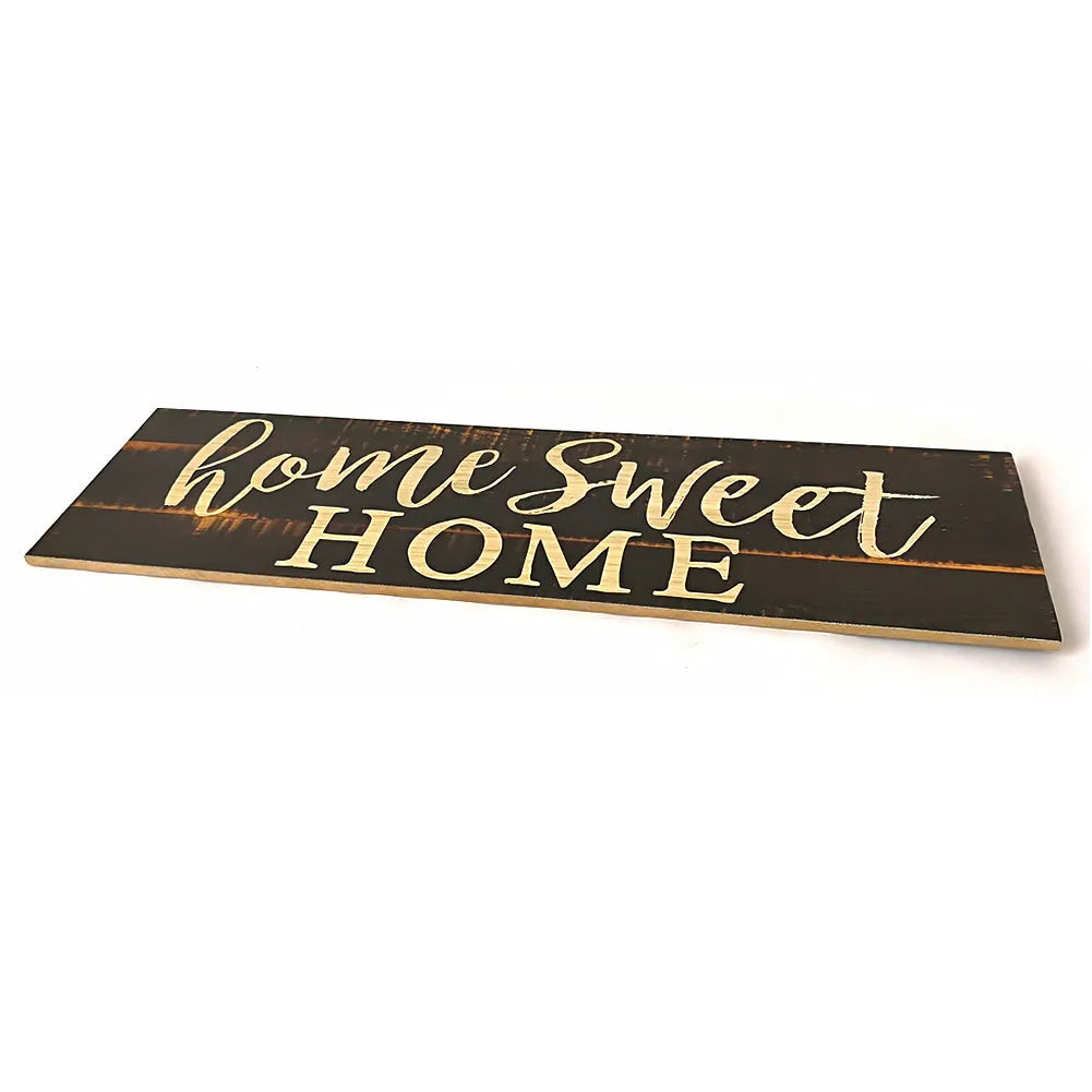 Hand-carved rectangular wooden wall hanging pendant in black finish, showing textured surface detail.