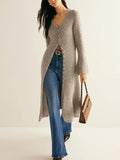 Khaki coloured French style retro long sleeve cardigan coat with button front closure.