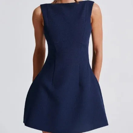 Slim-fitting backless sling dress with high waist and short skirt in a choice of colours.